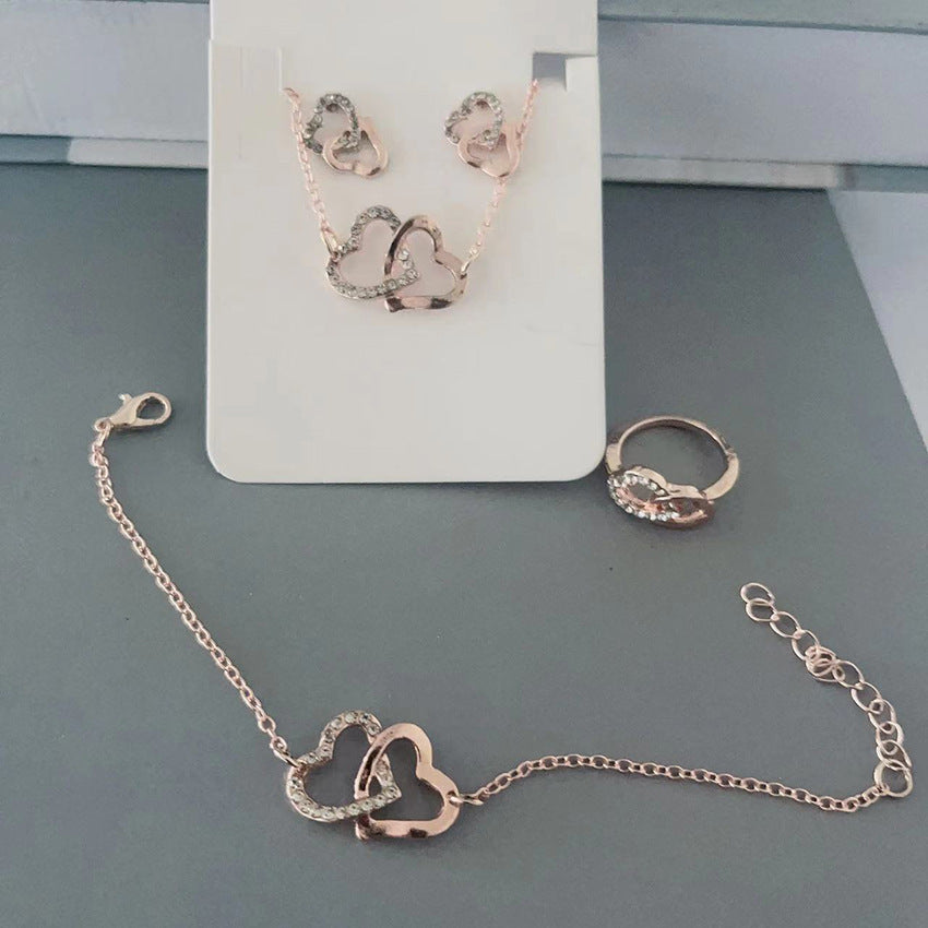 Butterfly Emblem Jewelry Set – Gold-Colored Necklace, Earrings, Bracelet & Ring with Imitation Pearls