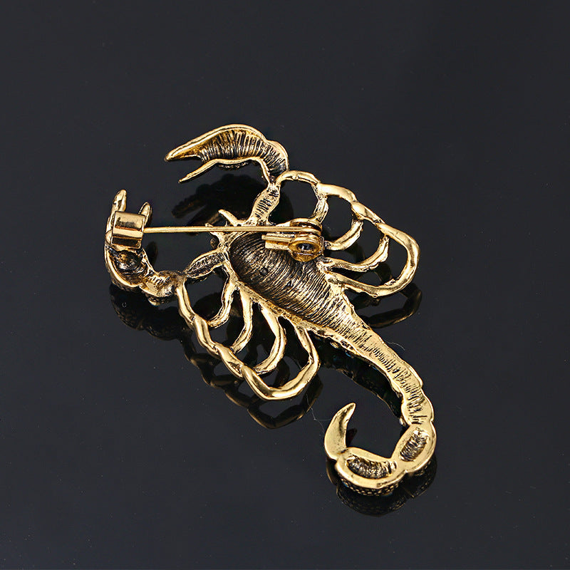 Scorpion-Inspired Rhinestone Brooch with Gemstone Inlay