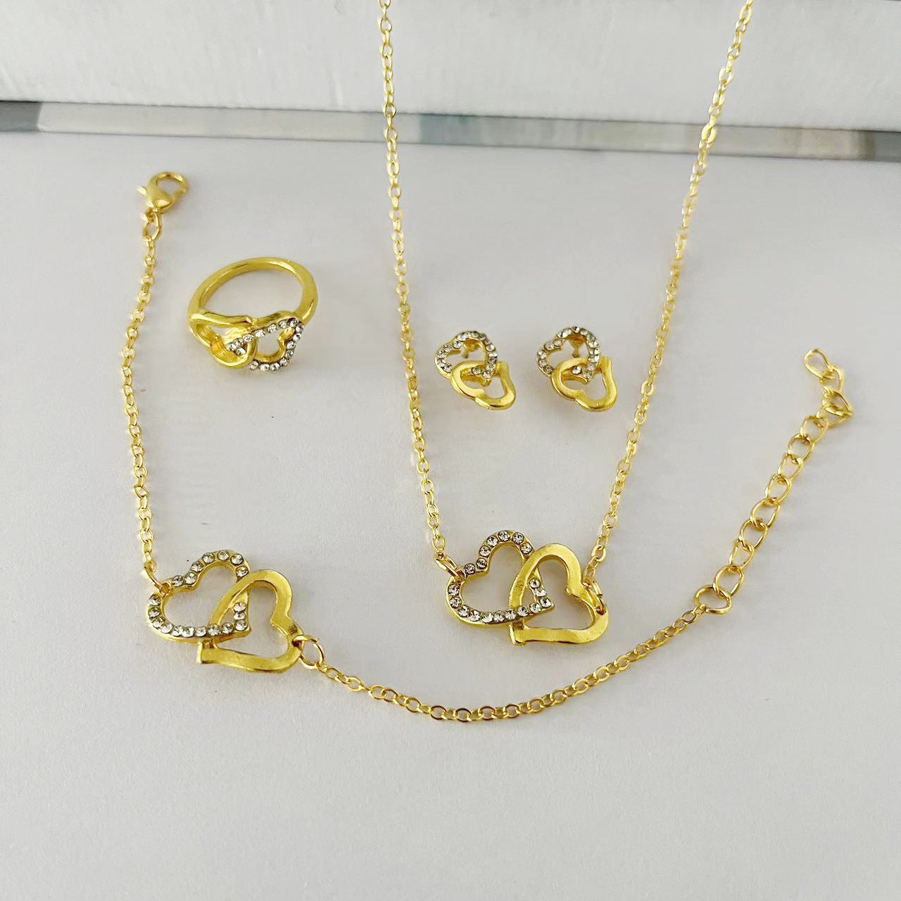 Butterfly Emblem Jewelry Set – Gold-Colored Necklace, Earrings, Bracelet & Ring with Imitation Pearls