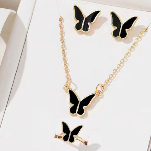 Butterfly Emblem Jewelry Set – Gold-Colored Necklace, Earrings, Bracelet & Ring with Imitation Pearls