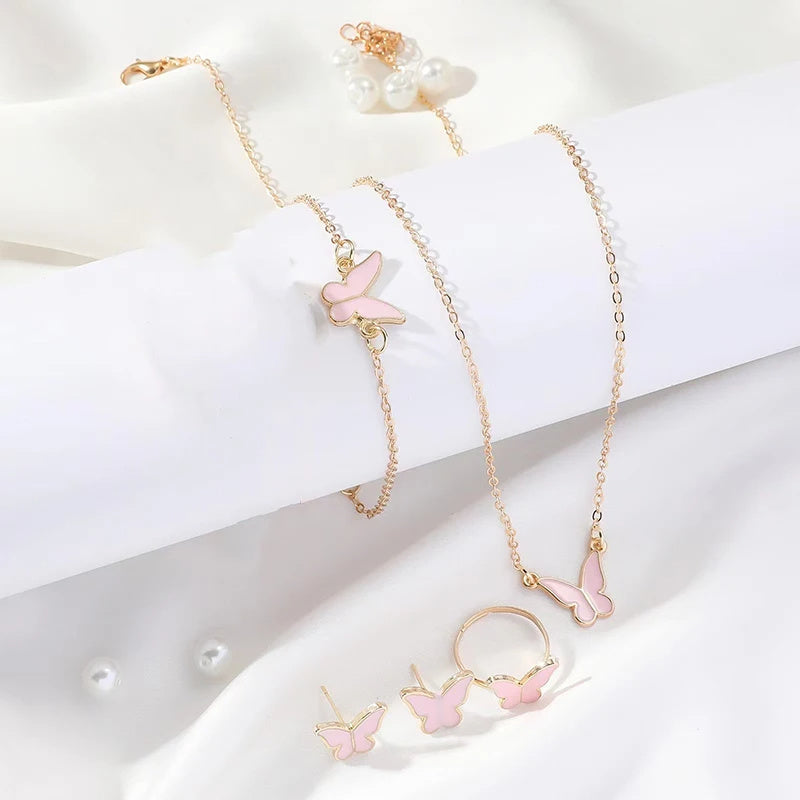 Butterfly Emblem Jewelry Set – Gold-Colored Necklace, Earrings, Bracelet & Ring with Imitation Pearls