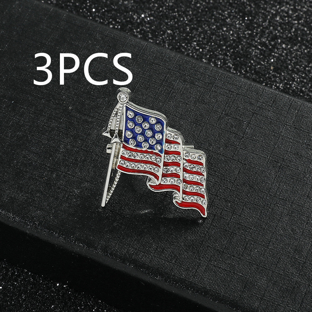 Golden “M” American Flag Brooch – Bold Patriotic Accent
