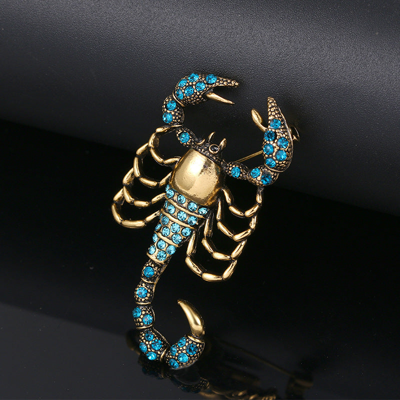 Scorpion-Inspired Rhinestone Brooch with Gemstone Inlay