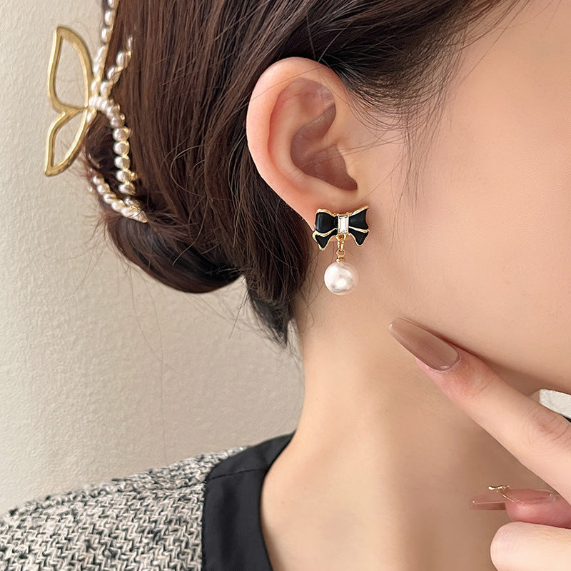 Women's Niche Black Bow Pearl Stud Earrings – Elegant & Unique Design