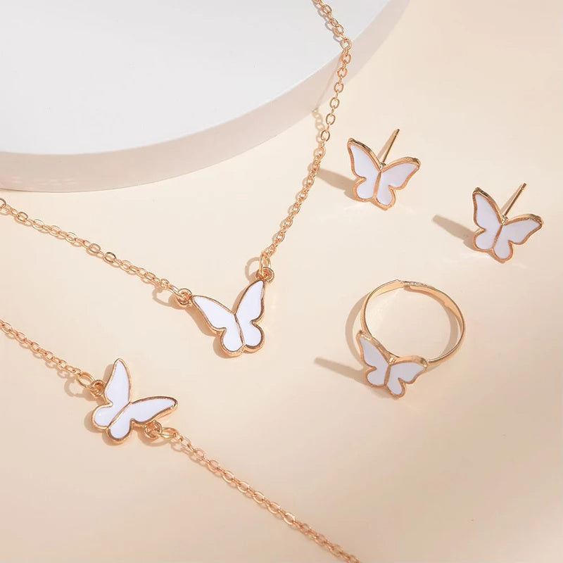 Butterfly Emblem Jewelry Set – Gold-Colored Necklace, Earrings, Bracelet & Ring with Imitation Pearls