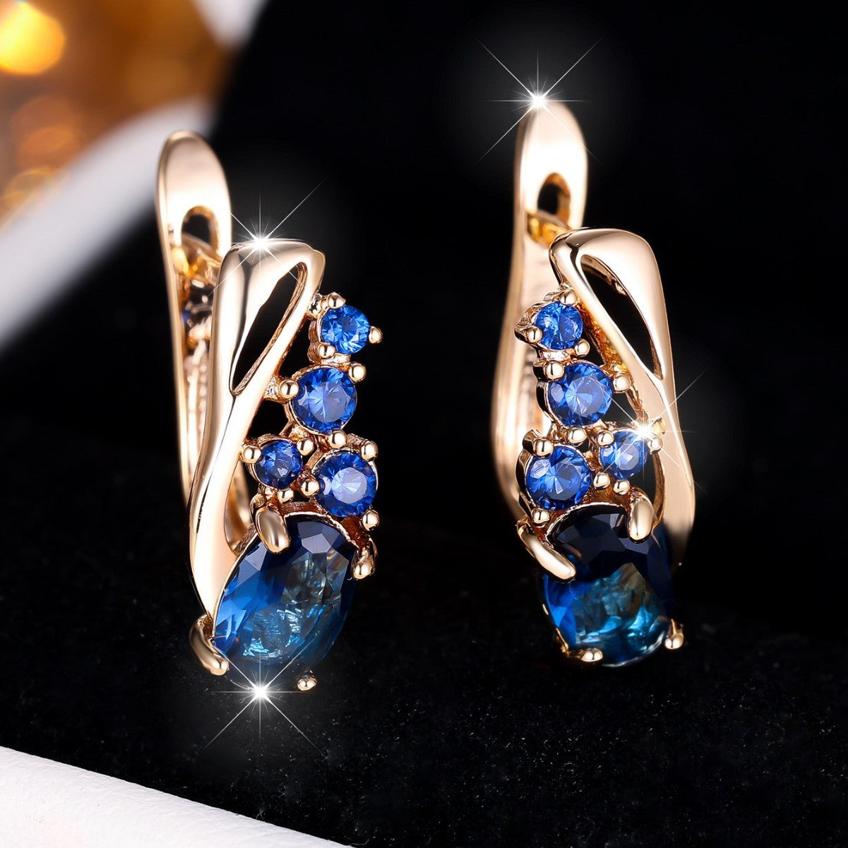 Champagne Gold Oval Crystal Earrings with Four Small Round Diamonds