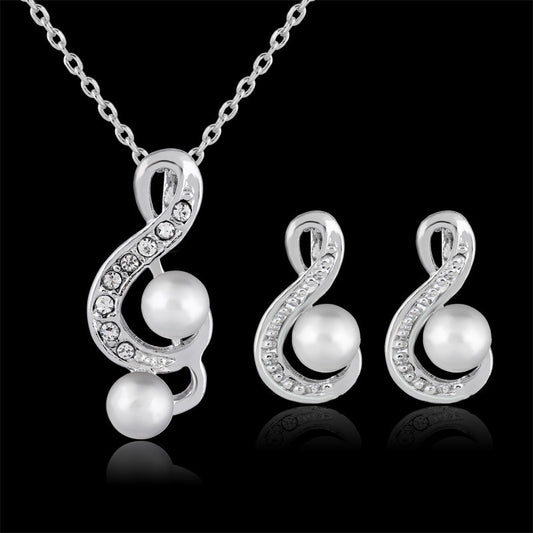 Elegant Bridal Jewelry Set – Silver-Coated Treble Clef Pendant with Imitation Pearls, Includes Matching Earrings.