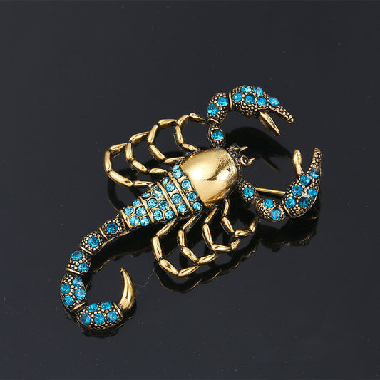 Scorpion-Inspired Rhinestone Brooch with Gemstone Inlay