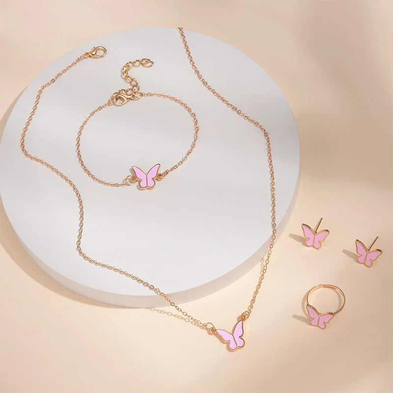 Butterfly Emblem Jewelry Set – Gold-Colored Necklace, Earrings, Bracelet & Ring with Imitation Pearls