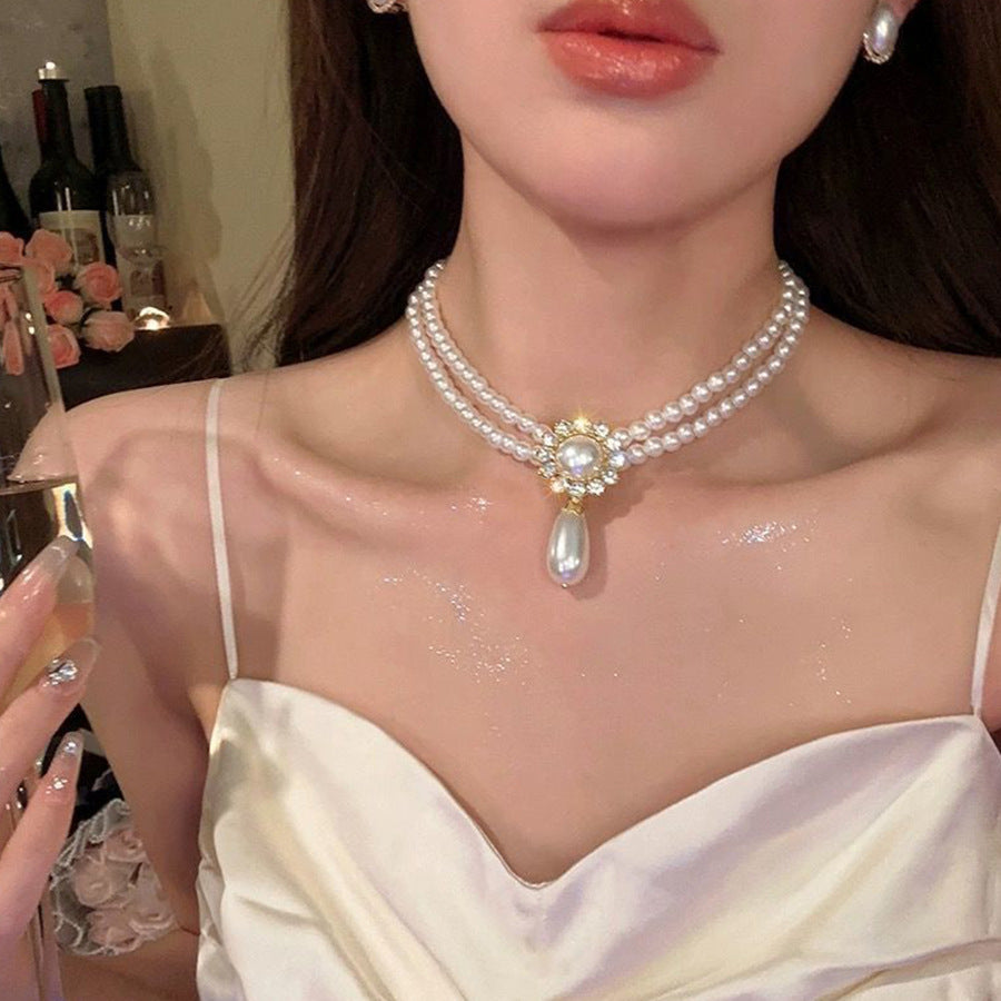 Rhinestone & Pearl Double-Layer Tassel Necklace – Elegant Layered Statement Jewelry