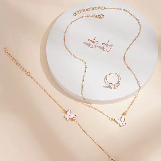 Butterfly Emblem Jewelry Set – Gold-Colored Necklace, Earrings, Bracelet & Ring with Imitation Pearls