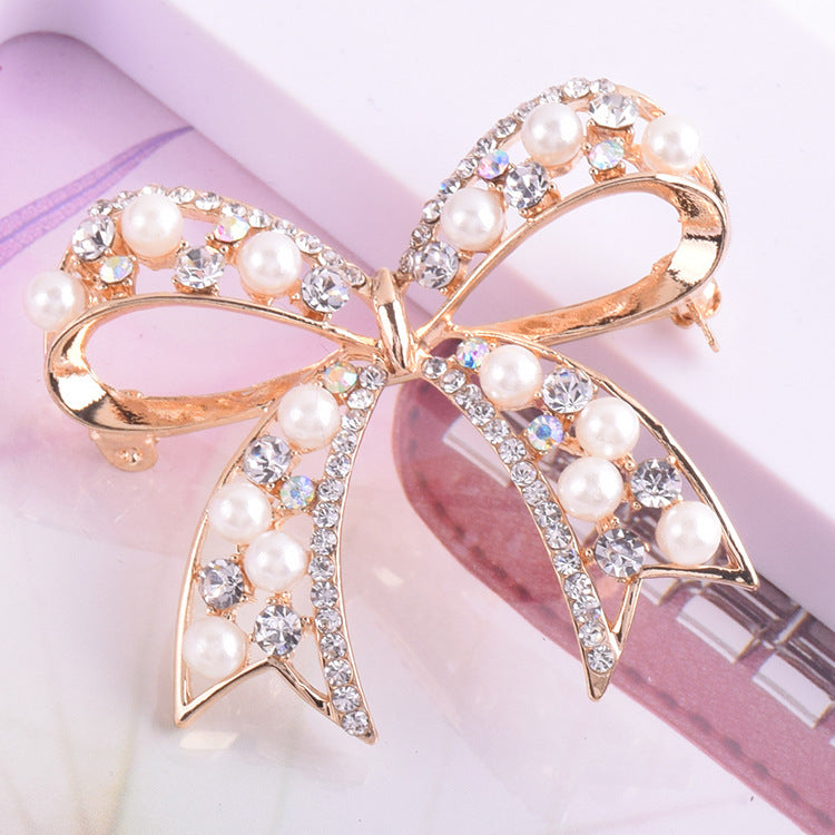 Graceful Bow Pearl Brooch – Elegant Women’s Fashion Accessory
